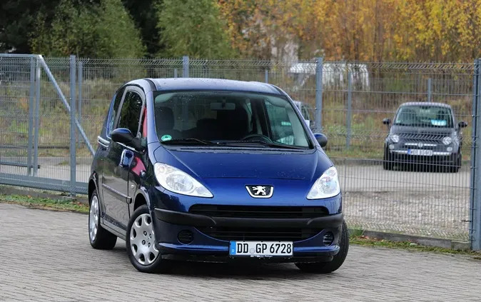 mazowieckie Peugeot 1007 cena 9900 przebieg: 123000, rok produkcji 2006 z Jędrzejów